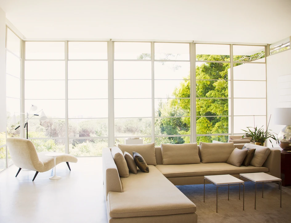 a living room with large windows a living room with large windows